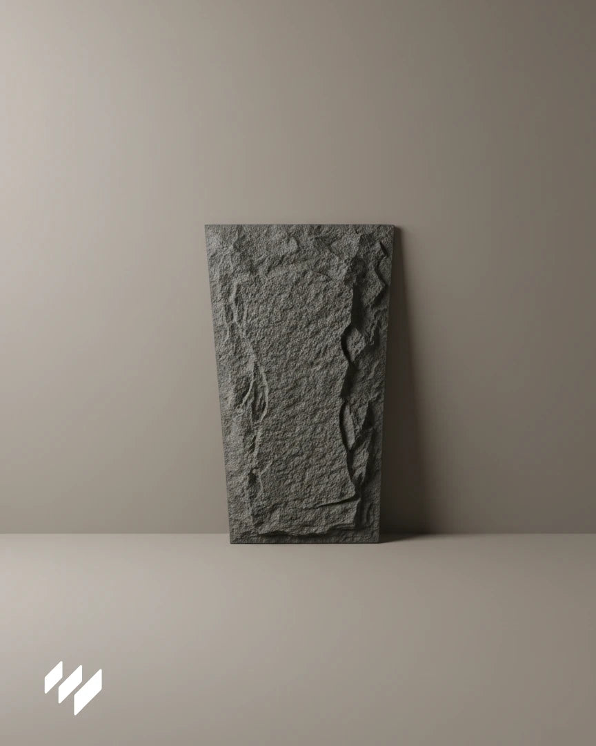 Vista frontal del panel decorativo PU efecto piedra Negro Basalto de Revestimientos Pared, mostrando la textura realista de roca natural.