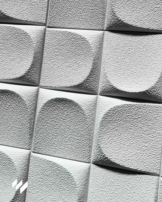 Detalle en primer plano del Panel decorativo 3D de PU efecto Almohadillado blanco de Revestimientos Pared, mostrando su textura acolchada en relieve para un diseño moderno.