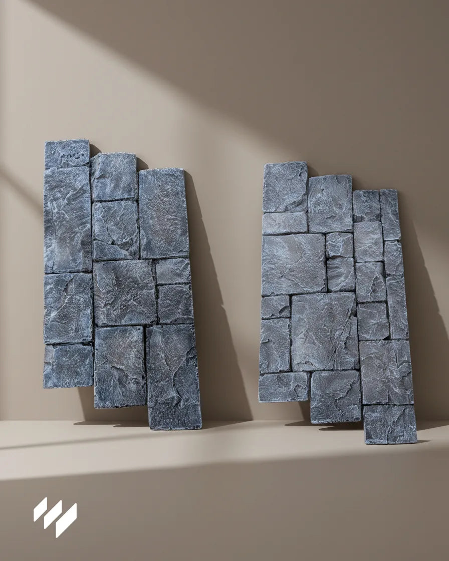 Panel decorativo Revestimientos Pared Fortaleza Basalto con efecto piedra volcánica, textura realista y acabado mate sobre fondo beige.