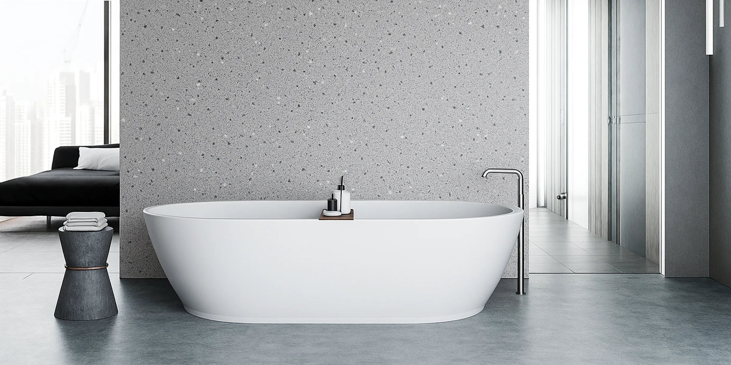 Baño moderno con pared revestida con panel SPC efecto terrazo gris, que aporta textura y estilo contemporáneo.