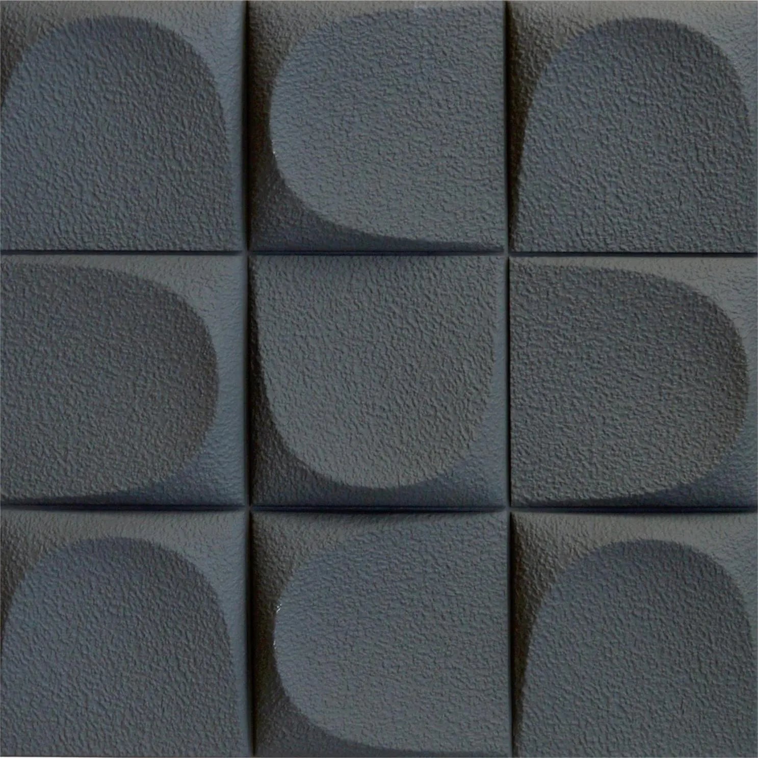 Detalle en primer plano del relieve y textura del panel decorativo 3D de PU efecto Almohadillado negro de Revestimientos Pared.